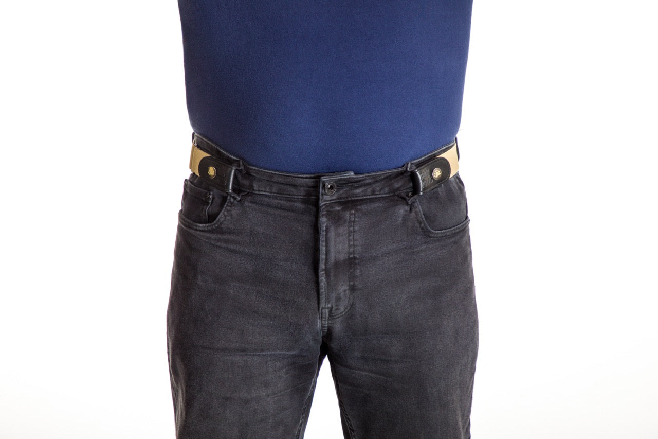 Person wearing black jeans and a blue shirt on a white background.