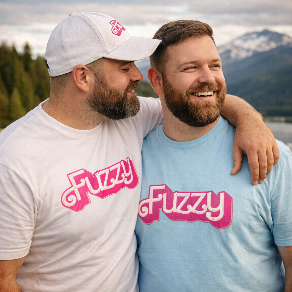 Two men wearing Pocket Bears Apparel 'Fuzzy' shirts with a mountainous background